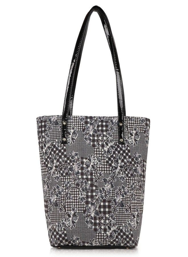 Daniel Clark حقيبة تسوق أنيقة من دانيال كلارك باللونين الأسود والأبيض بنقشة زهور مرقعة ومقابض لامعة (أسود) - Image 1